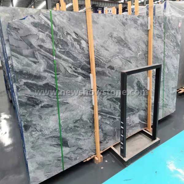 Green and light grey marble slabs