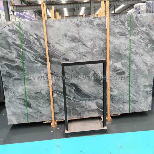 Green and light grey marble slabs